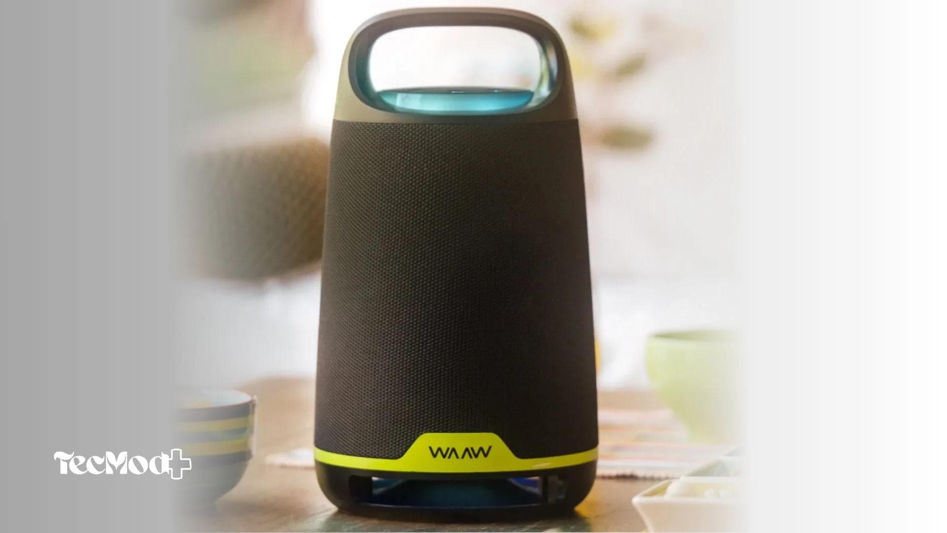 Design cilíndrico da caixa de som WAAW Boom 200 com alça de transporte.